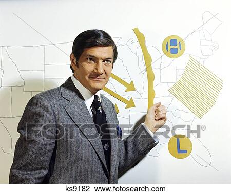 1970S Tv Television Weatherman Stand In Front Of Weather Map Talking To Camera Meteorology High Low Front Isobar View Large Photo Image Stock Image - 1970S Tv Television Weatherman Stand In Front Of Weather Map Talking To Camera Meteorology High Low Front Isobar. Fotosearch