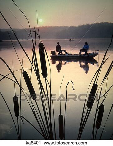 1980S Fishermen Two Men Sitting In Motor Boat Fishing On Lake In Evening Cattails In Foreground View Large Photo Image Stock Image - 1980S Fishermen Two Men Sitting In Motor Boat Fishing On Lake In Evening Cattails In Foreground. Fotosearch