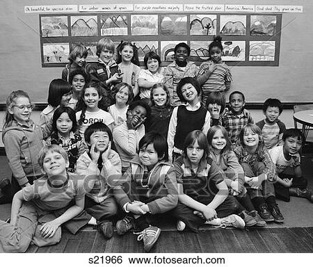 1980S Group Portrait Of Grade School Class Making Funny Faces View Large Photo Image Stock Photograph - 1980S Group Portrait Of Grade School Class Making Funny Faces . Fotosearch