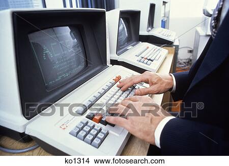 1980S Male Hands On Keyboard Of Texas Instruments Computer View Large Photo Image Picture - 1980S Male Hands On Keyboard Of Texas Instruments Computer . Fotosearch