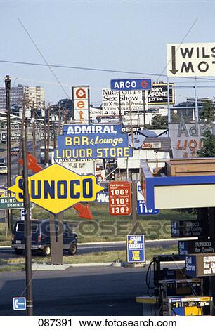 1980S Proliferation Billboards Signs Gas Station View Large Photo Image Stock Image - 1980S Proliferation Billboards Signs Gas Station. Fotosearch