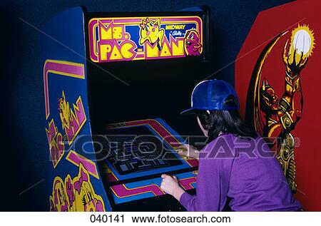 1980S Teen Girl Wear Baseball Cap Playin G Pac Man Video Game In Arcade View Large Photo Image Stock Image - 1980S Teen Girl Wear Baseball Cap Playin G Pac Man Video Game In Arcade . Fotosearch
