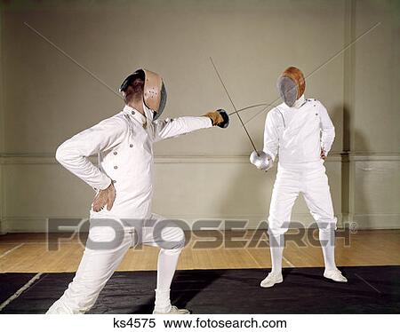 2 People Opponents Fencing Sword Epee Foil Face Mask Padded Vest Protection Repartee On Guard Lunge Duel View Large Photo Image Stock Photography - 2 People Opponents Fencing Sword Epee Foil Face Mask Padded Vest Protection Repartee On Guard Lunge Duel . Fotosearch
