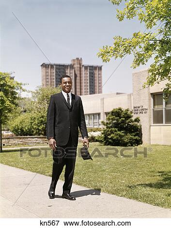 Stock Photo - African American Business Man Briefcase Hat Urban City Suit . Fotosearch