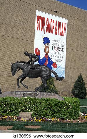 Stock Photography - Amarillo Texas American Quarter Horse Heritage Center And Museum Statue Of Jockey Riding Horse . Fotosearch
