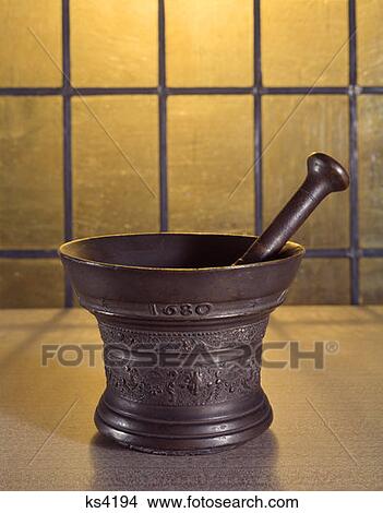 Picture - Ancient 1680 Mortar And Pestle . Fotosearch