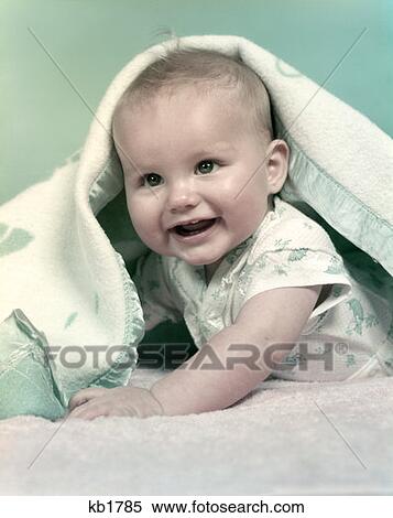 Stock Photography - Baby Boy Smiling Blanket. Fotosearch