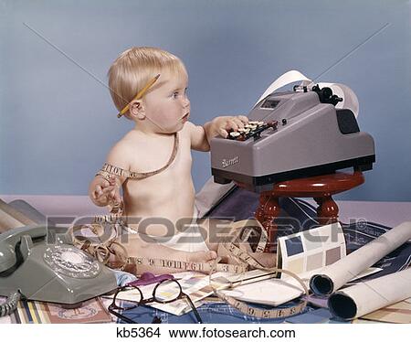 Baby Child Office Rotary Telephone Adding Machine Accountant Accounting 1970 1970S Retro View Large Photo Image Picture - Baby Child Office Rotary Telephone Adding Machine Accountant Accounting 1970 1970S Retro. Fotosearch