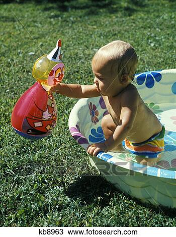 Baby Pool Playing Water Summer Sunny Clown Toy View Large Photo Image Stock Image - Baby Pool Playing Water Summer Sunny Clown Toy . Fotosearch