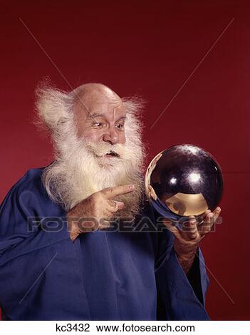 Balding White Haired Man In Robe Looking At Silver Ball He Is Holding Studio View Large Photo Image Stock Image - Balding White Haired Man In Robe Looking At Silver Ball He Is Holding Studio . Fotosearch