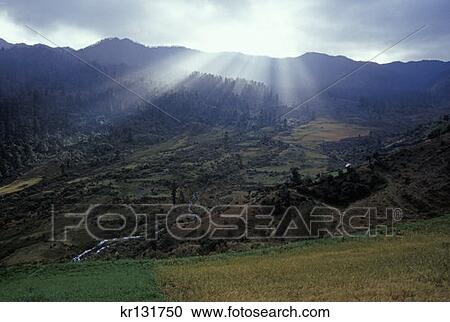 Stock Image - Bhutan Landscape Mountain Fog . Fotosearch