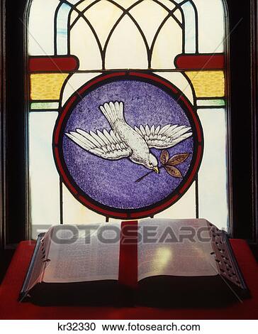 Bible And Stained Glass Church Window Flying Dove Carrying An Olive Branch View Large Photo Image Stock Image - Bible And Stained Glass Church Window Flying Dove Carrying An Olive Branch. Fotosearch
