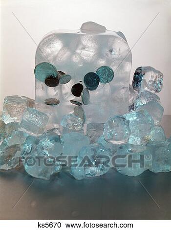 Block Of Ice With Coins Frozen Inside Imbedded Cold Cash Frozen Assets Finance Ice Cubes Freeze Accounts Retro Vintage View Large Photo Image Stock Image - Block Of Ice With Coins Frozen Inside Imbedded Cold Cash Frozen Assets Finance Ice Cubes Freeze Accounts Retro Vintage. Fotosearch