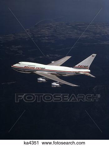Stock Image - Boeing 747 Sp Aircraft In Air Aloft Jet Passenger Commercial Airliner. Fotosearch