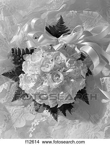 Bouquet Of White Roses Tied Up With Ribbon On Background Of White Lace View Large Photo Image Picture - Bouquet Of White Roses Tied Up With Ribbon On Background Of White Lace . Fotosearch