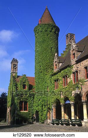 Stock Image - Bruges Belgium Gruuthuse Museum With Ivy Covered Tower . Fotosearch