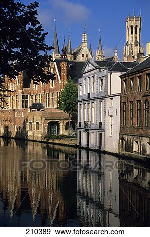 Stock Photo - Bruges Belgium Row Of Buildings Along Canal . Fotosearch