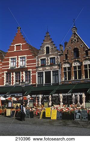 Stock Photograph - Bruges Belgium Shop And Cafes In The Market . Fotosearch