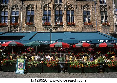 Stock Photograph - Bruges Belgium Sidewalk Tables At Cafe In The Burg . Fotosearch