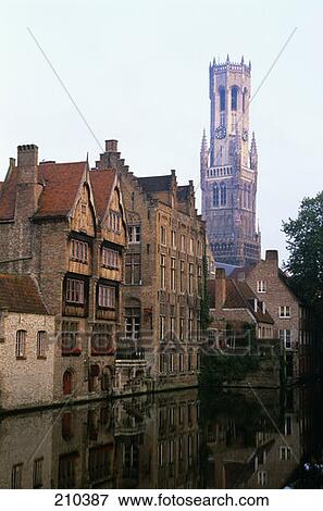 Bruges Belgium View Of Boats On Canal And The Belfry  View Large Photo Image Stock Photo - Bruges Belgium View Of Boats On Canal And The Belfry . Fotosearch