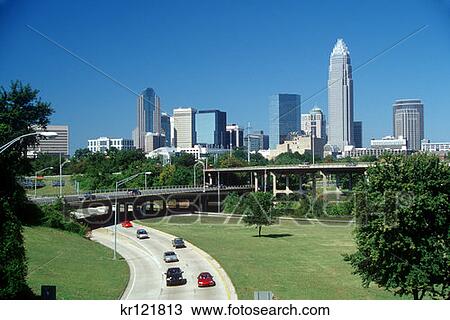 Stock Image - Charlotte Nc Skyline And Highway . Fotosearch