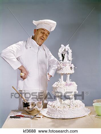 Chef Looking At Wedding Cake View Large Photo Image Stock Photo - Chef Looking At Wedding Cake . Fotosearch