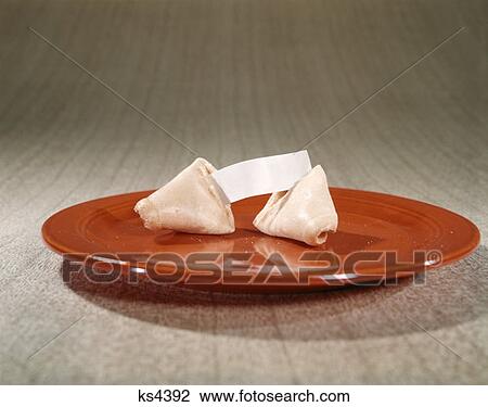 Stock Image - Chinese Fortune Cookie On Red Plate. Fotosearch