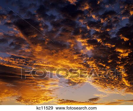 Clouds With Sunrise Sunset Glow View Large Photo Image Stock Photo - Clouds With Sunrise Sunset Glow. Fotosearch
