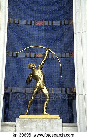 Stock Photograph - Dallas Tx Fair Park Archer Statue At Entrance To Hall Of State . Fotosearch
