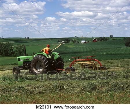 Dubuque County Ia 1980 1980S Green Tactor Farm Farmer Hay Haying Field View Large Photo Image Stock Image - Dubuque County Ia 1980 1980S Green Tactor Farm Farmer Hay Haying Field . Fotosearch