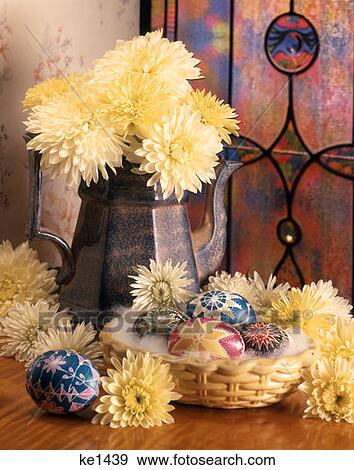 Easter Still Life Pottery Coffee Pot Full Of Yellow Flowers Small Basket Full Deocrated Eggs Leaded Glass Window View Large Photo Image Stock Photo - Easter Still Life Pottery Coffee Pot Full Of Yellow Flowers Small Basket Full Deocrated Eggs Leaded Glass Window. Fotosearch