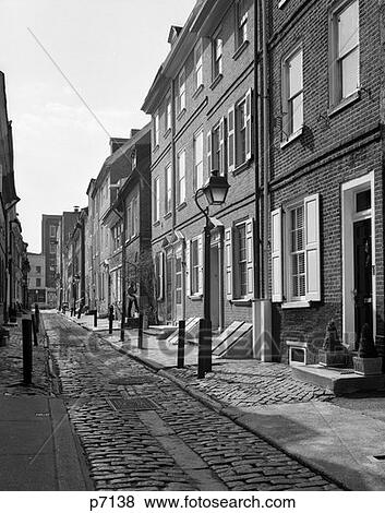 Elfreth'S Alley In Philadelphia - Narrow Historical Brick Street Lined With Quaint Rowhomes View Large Photo Image Stock Photo - Elfreth'S Alley In Philadelphia - Narrow Historical Brick Street Lined With Quaint Rowhomes . Fotosearch