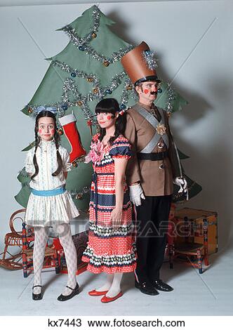 Family Costume Posing As Christmas Characters Front Christmas Tree View Large Photo Image Stock Image - Family Costume Posing As Christmas Characters Front Christmas Tree. Fotosearch