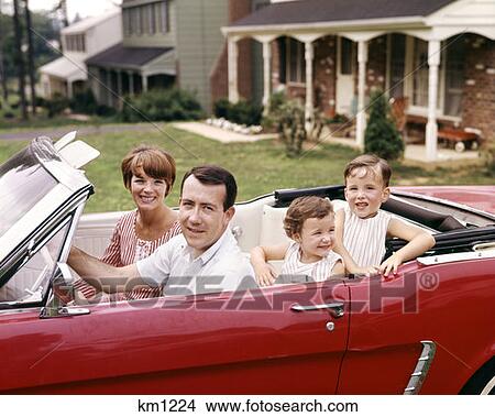 Picture - Family In Red Convertible . Fotosearch