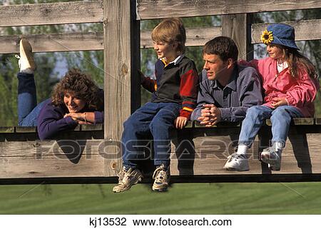 Family Of Four On Wooden Bridge View Large Photo Image Stock Image - Family Of Four On Wooden Bridge . Fotosearch
