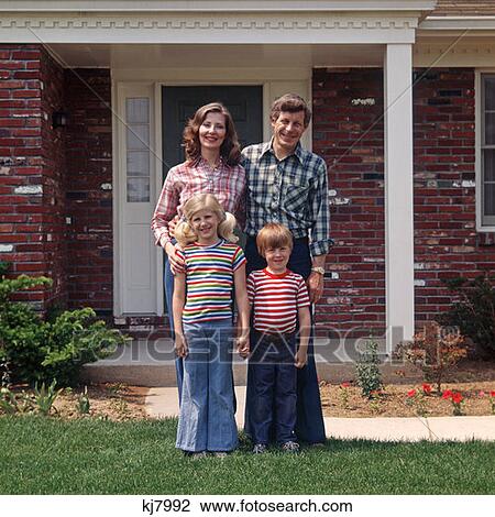 Family Posing On Front Lawn Outside House View Large Photo Image Stock Image - Family Posing On Front Lawn Outside House. Fotosearch
