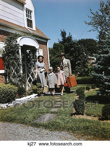 Family With Luggage In Front Of Home View Large Photo Image Stock Photo - Family With Luggage In Front Of Home. Fotosearch