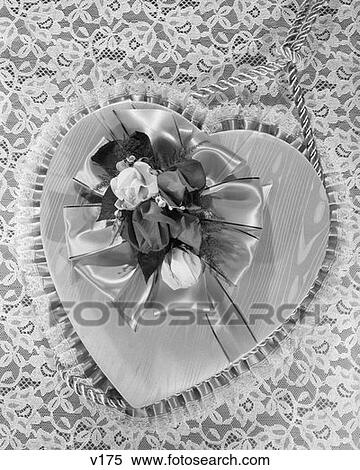 Fancy Valentine Heart Box Covered With Satin Ribbon & Silk Flowers On Lace Tablecloth View Large Photo Image Stock Photography - Fancy Valentine Heart Box Covered With Satin Ribbon & Silk Flowers On Lace Tablecloth . Fotosearch
