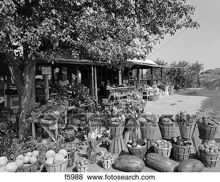 Farmer'S Market With Bushel Baskets Of Fruits & Vegetables In Foreground View Large Photo Image Stock Photo - Farmer'S Market With Bushel Baskets Of Fruits & Vegetables In Foreground . Fotosearch