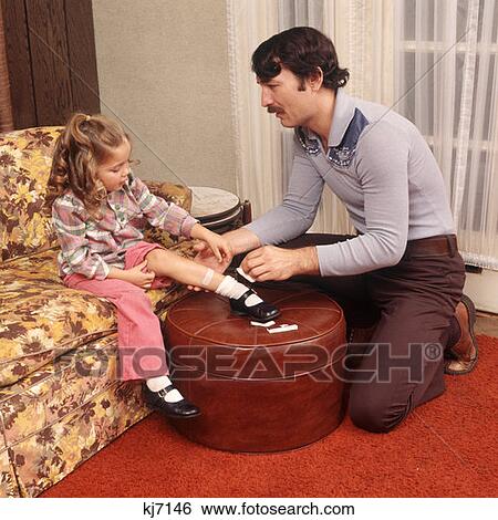 Father Helping Daughter With A Cut On Knee View Large Photo Image Stock Photograph - Father Helping Daughter With A Cut On Knee. Fotosearch