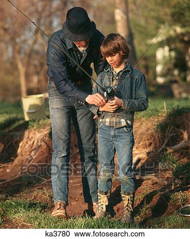 Father Son Fishing Pole Denim Sports Teaching 1970 1970S Retro View Large Photo Image Stock Image - Father Son Fishing Pole Denim Sports Teaching 1970 1970S Retro . Fotosearch