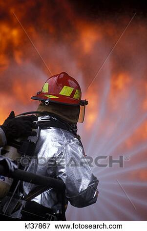 Firefighter Training At Pit Fire View Large Photo Image Stock Photo - Firefighter Training At Pit Fire . Fotosearch