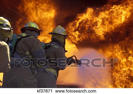 Firefighters Training At Pit Fire View Large Photo Image Stock Image - Firefighters Training At Pit Fire . Fotosearch