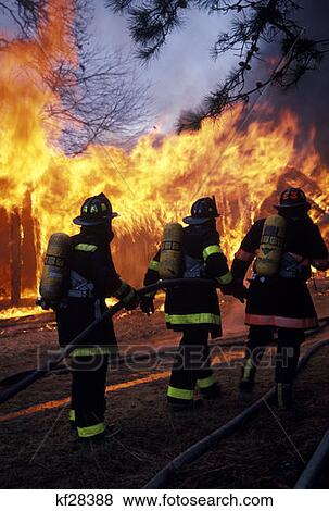 Firemen With Gas Mask Full Gear Flames In Background View Large Photo Image Stock Photo - Firemen With Gas Mask Full Gear Flames In Background . Fotosearch