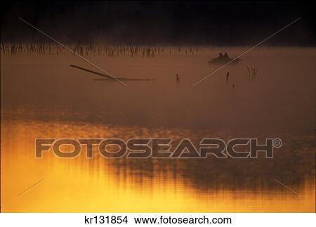Fishing Crane Prairie Resevoir Snags Sunrise Cascades Lake National Scenic Byway Deschutes National Forest View Large Photo Image Picture - Fishing Crane Prairie Resevoir Snags Sunrise Cascades Lake National Scenic Byway Deschutes National Forest . Fotosearch