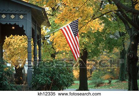 Flag Hanging From Porch In Autumn View Large Photo Image Stock Photography - Flag Hanging From Porch In Autumn . Fotosearch