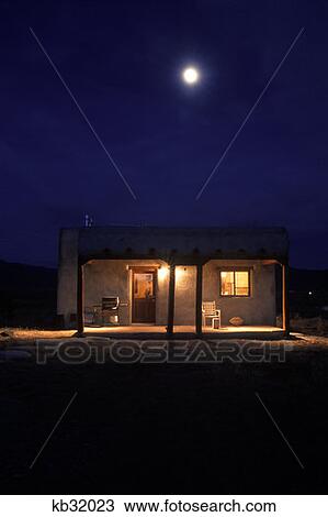 Stock Image - Full Moon Above Adobe House At Night Taos Nm . Fotosearch