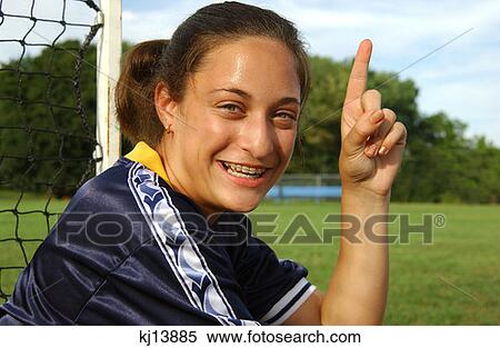 Girl Soccer Player, Goalie, Giving The Number One Sign View Large Photo Image Stock Photography - Girl Soccer Player, Goalie, Giving The Number One Sign. Fotosearch