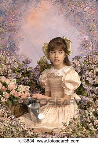 Girl Wearing Old Fashioned Pink Smocked Dress And Bow In Hair Holding Watering Can Sitting Among Flowers View Large Photo Image Picture - Girl Wearing Old Fashioned Pink Smocked Dress And Bow In Hair Holding Watering Can Sitting Among Flowers . Fotosearch