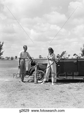 Golfers Couple Man Woman Car Miami Biltmore Florida View Large Photo Image Stock Photo - Golfers Couple Man Woman Car Miami Biltmore Florida. Fotosearch